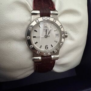 Movado Silver and Brown Timepiece
